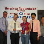 John Gasparian and the American Reclamation Team presenting a check to support Kim Rhode in her pursuit of Olympic Success.